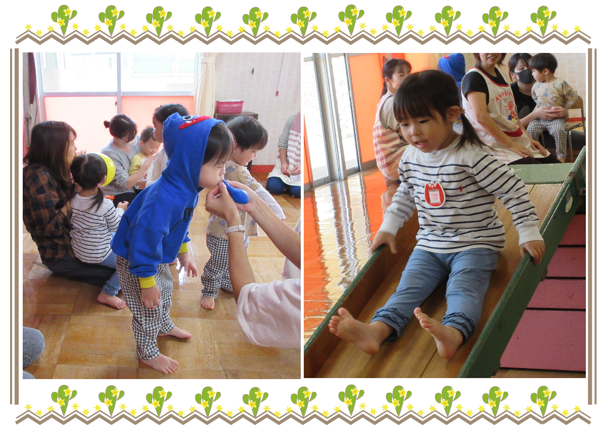 風船を膨らまそうとしている男の子とすべり台をしている女の子